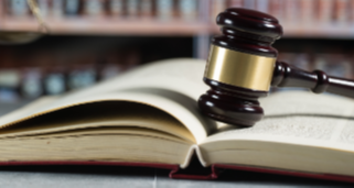 gavel resting on open book